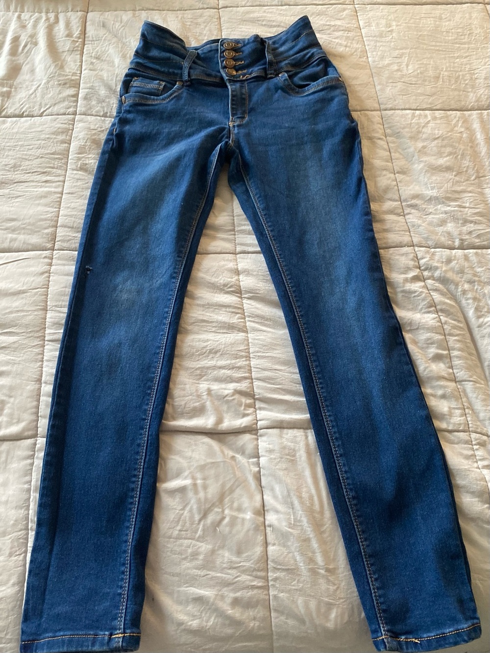 High-Rise Skinny Jeans in Dark Blue with Triple-Button Waist